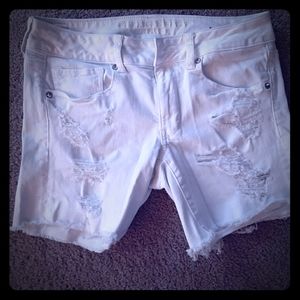 AE Midi White Distressed Shorts